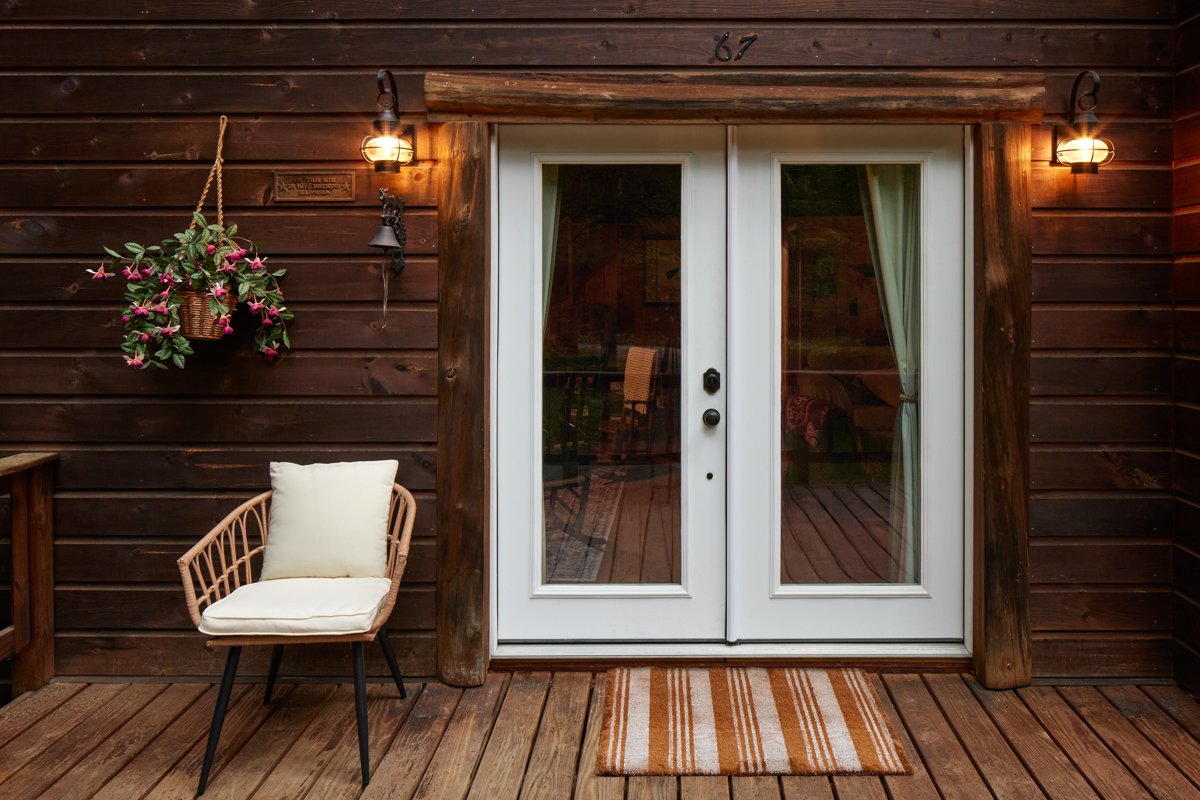 Front entry of the Adirondack cabin, welcoming guests