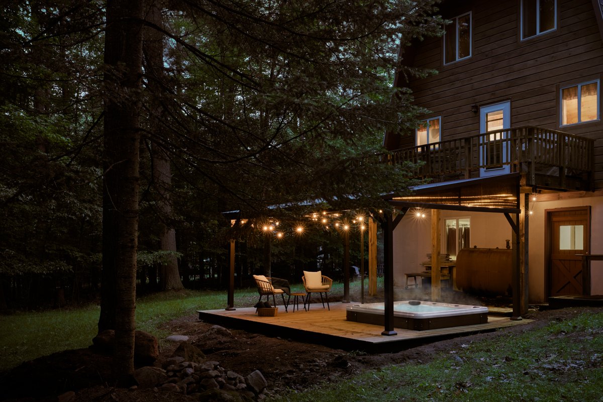 Hot tub staged for golden hour at the Adirondack cabin