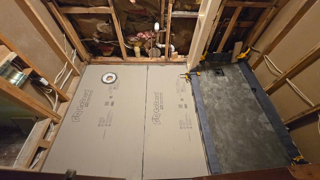 Jay bathroom renovation down to studs and subfloor, new shower pan base going in